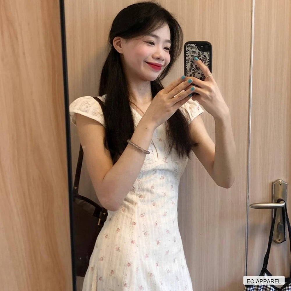 Women's White Floral V-Neck Maxi Dress with Flutter Sleeves — Real outfit styling view