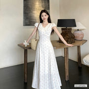 Women's White Floral Fit-and-Flare V-Neck Maxi Dress — Real outfit styling view