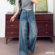 Women's Blue High-Rise Full-Length Wide-Leg Jeans — Real-life product view